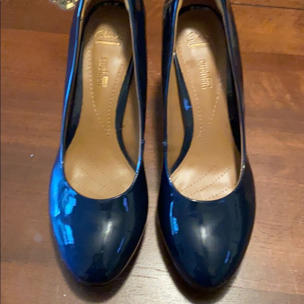 Clark’s navy patent pumps